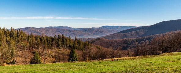 Autumn Beskid Slaski mountains from meadow bellow Mala Czantoria hill summit in Poland