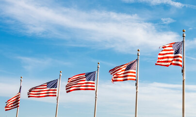 A group of American flags waving
