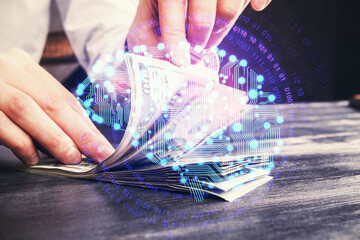 Multi exposure of brain drawing hologram and us dollars bills and man hands. Ai invest concept