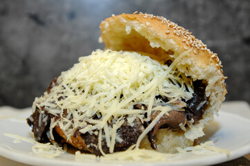 Bread with spleen called pane ca meusa is a tyical street food of Palermo city in Sicily
