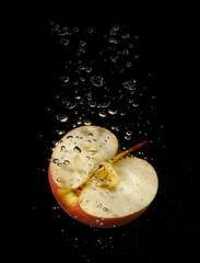 Apple half splashing