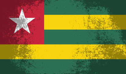 Grunge Togo flag. Togo flag with waving grunge texture.