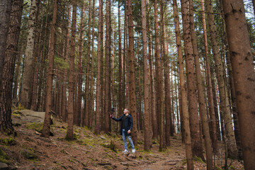 Fototapeta premium Guy shoots a blog on camera