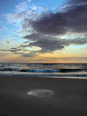 Fototapeta na wymiar Clouds,sky,sea and sand.