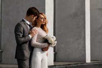 Blonde bride with her husband