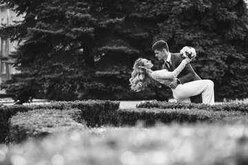 Newlyweds walk around city.