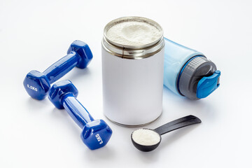 Sport diet nutrition with whey prorein and dumbbells