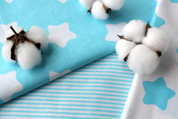 Natural cotton. Fabrics in delicate shades. Concept - sewing and sewing children's clothing and bed linen.