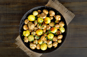 Delicious fried mushrooms with potatoes