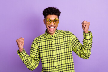 Photo portrait of guy funky wearing golden glasses with dollar sign gesturing like winner isolated...
