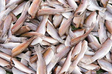 Dried fish without scales and head with tail and fins