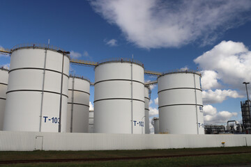 Oil tanks for storage at the HES terminal in the Botlek Harbor in the port of Rotterdam
