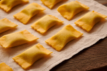 Raw homemade ravioli pasta with spinach and ricotta