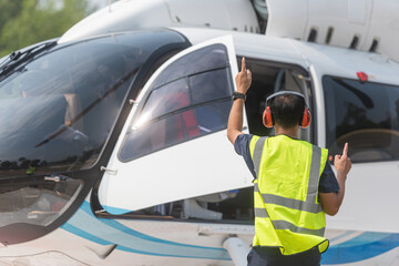 Helicopter Landing Officer(HLO) are training operations at the helipad.