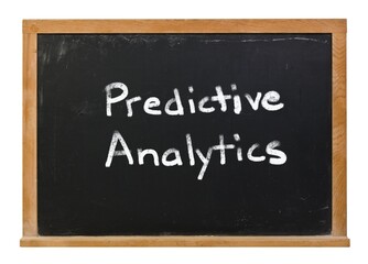Obraz premium Predictive Analytics written in white chalk on a black chalkboard isolated on white