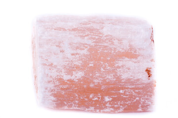 mineral stone macro red plaster on the white background
