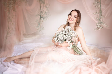 Fototapeta premium Beautiful and happy pregnant woman. Pregnancy. Happy mother. Future mother.