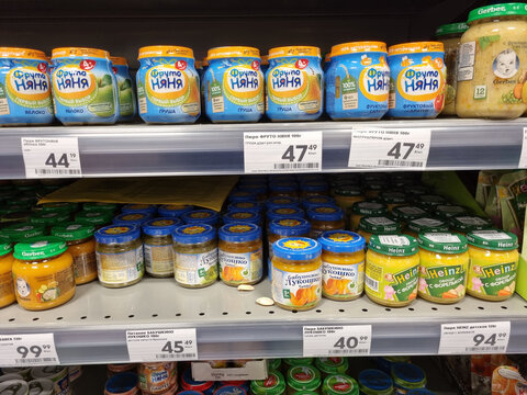 baby food on the shelves in the supermarket