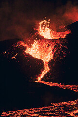 Lava erupting from the volcanic crater in Iceland, live lava creates shapes.  © Veniamin