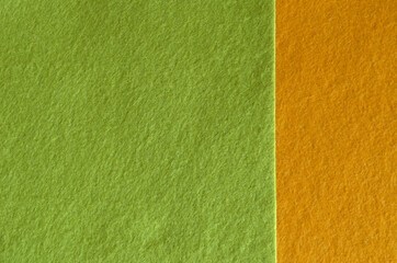 Fototapeta premium Yellow and green felt fabric texture for background.