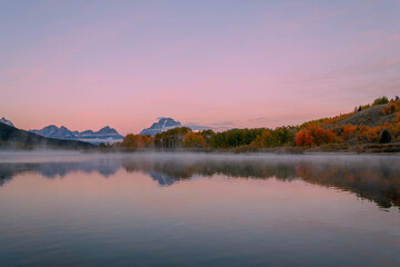 Scenic Reflection Landscape of the Moon Setting in the Tetons in Autumn