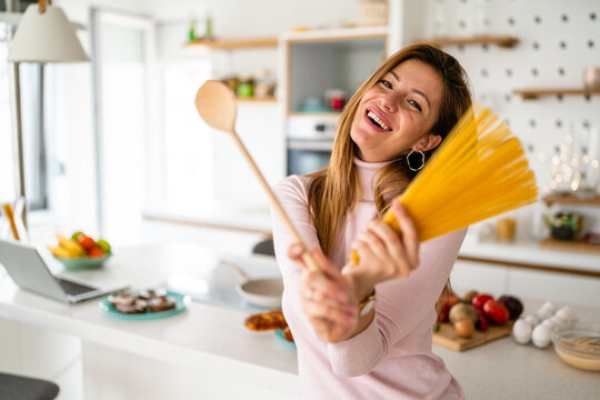 Beautiful Woman Having Fun In Kitchen At Home