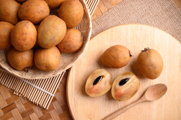 Sapodilla fruit (Manilkara zapota) and other names such as sapota, chikoo, chico, naseberry, or...