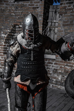 A knight in armor in a castle