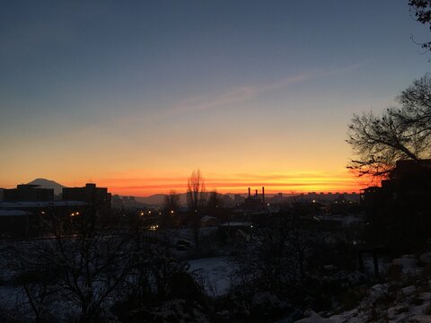 sunset over the river. City sunset, beautiful evening with colorful sky.  background wallpaper