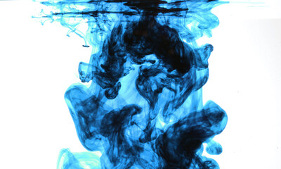 The entry of blue color into the liquid. Visible surface from below and color movement