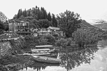 Black and white photos of a romantic fishing village located on Skadar Lake. Location: Montenegro, Virpazar
