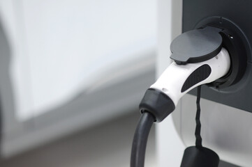 New energy Is electric power for cars Charging a new battery Future car transportation.