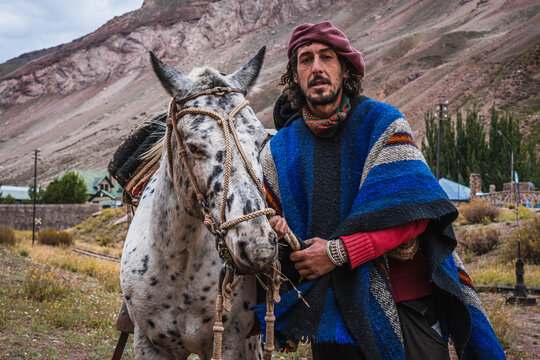 Gaucho resting with his horse.