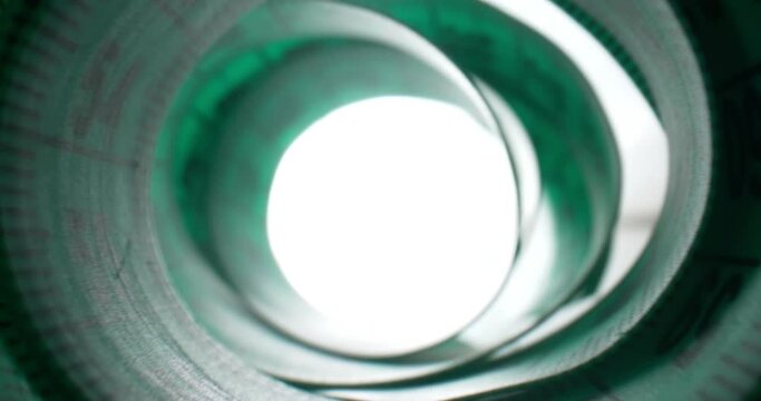 detailed extreme close-up view of the inside of a spiral-wound measuring tape.