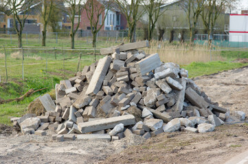 Pile of grey old construction bricks