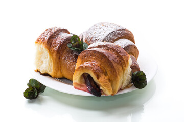 baked sweet homemade buns with plum inside