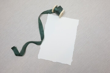 Wedding card mockup with eucalyptus and ribbon