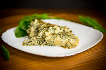 fried egg omelet with spring sorrel inside