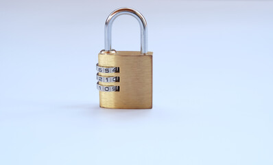 Close up, golden padlock with password,pass code on white background. There is no need key to use this padlock