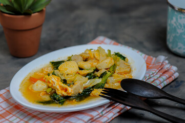 Capcai or capcay is the name of a typical Chinese-Indonesian dish in the form of many kinds of vegetables cooked by boiling or stir-frying. Capcai was originally a variation of a typical Fujian dish.