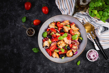 Tuscan Panzanella, traditional Italian salad with tomatoes and bread. Vegetarian panzanella salad. Mediterranean healthy food. Top view, copy space