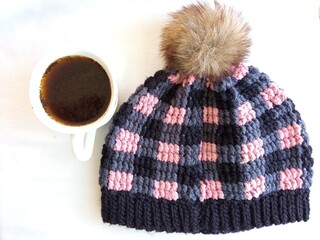 Fototapeta na wymiar cup of coffee with a hat