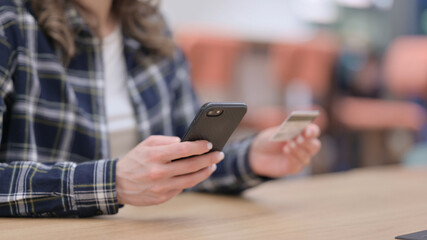 Female Hands Making Online Payment on Smartphone, Close up