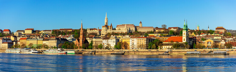 Morning in Budapest, city embankment, reflection of buildings in the water, cityscape
