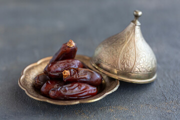 dried date  fruit on dark background