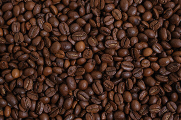 Coffee beans background close up.