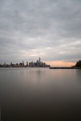 Fototapeta na wymiar Lower Manhattan from Hoboken, NJ on a cloudy evening