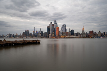 Fototapeta na wymiar Midtown Manhattan from Hoboken, NJ on a cloudy evening