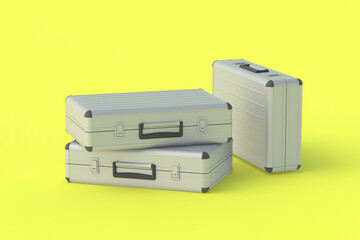 Metal suitcases for money or documents on yellow background. 3d render
