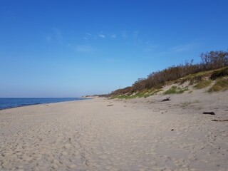 Sandy coast of the blue sea